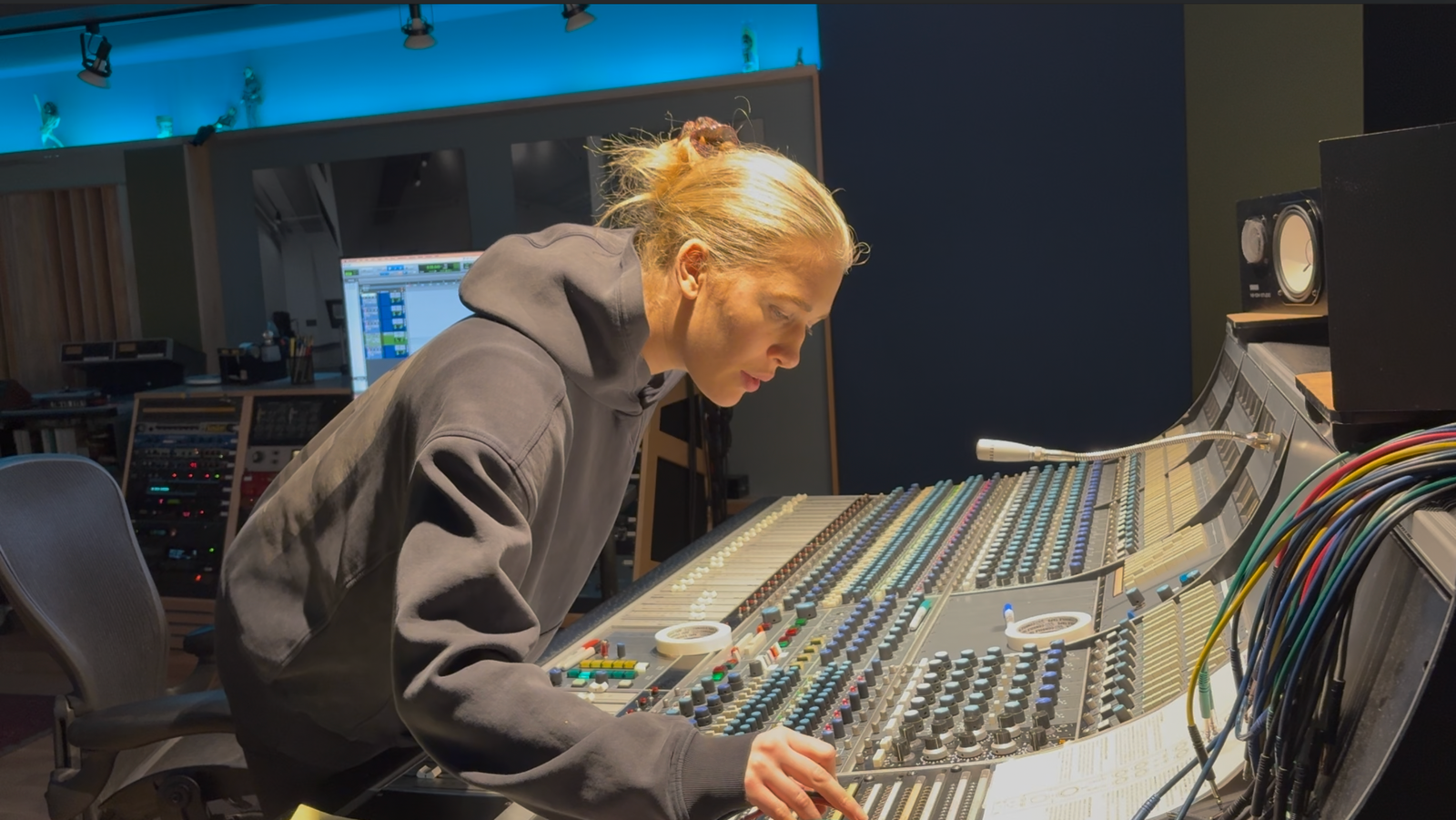 Marie working in an audio recording studio